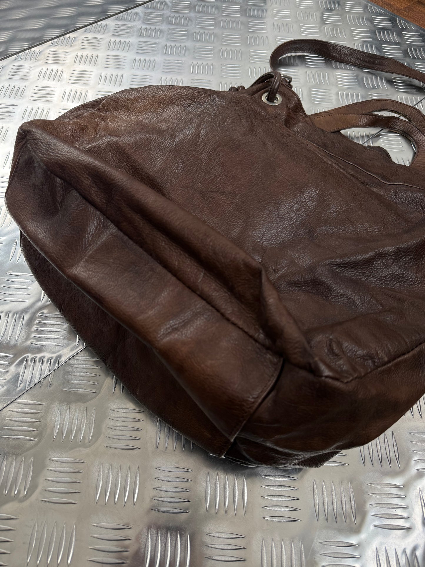 Vintage leather bucket bag TWINKLING GLOBAL