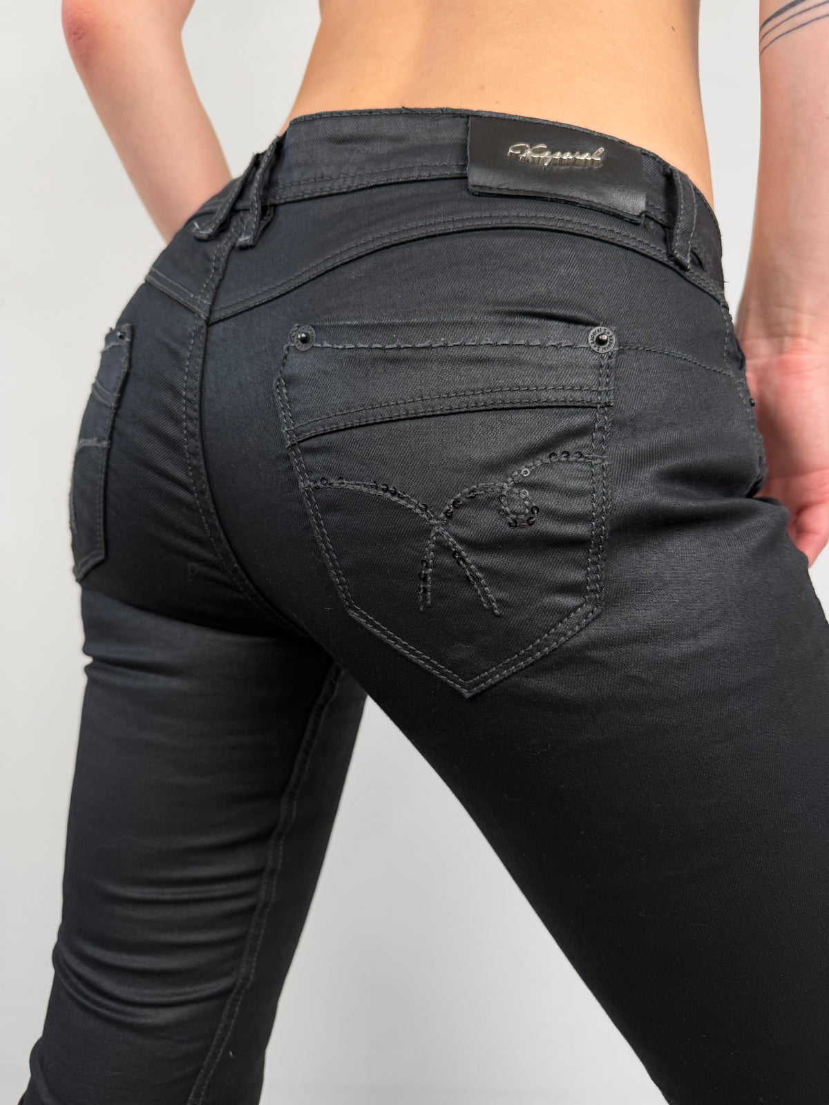 Black waxed denim jeans TWINKLING GLOBAL