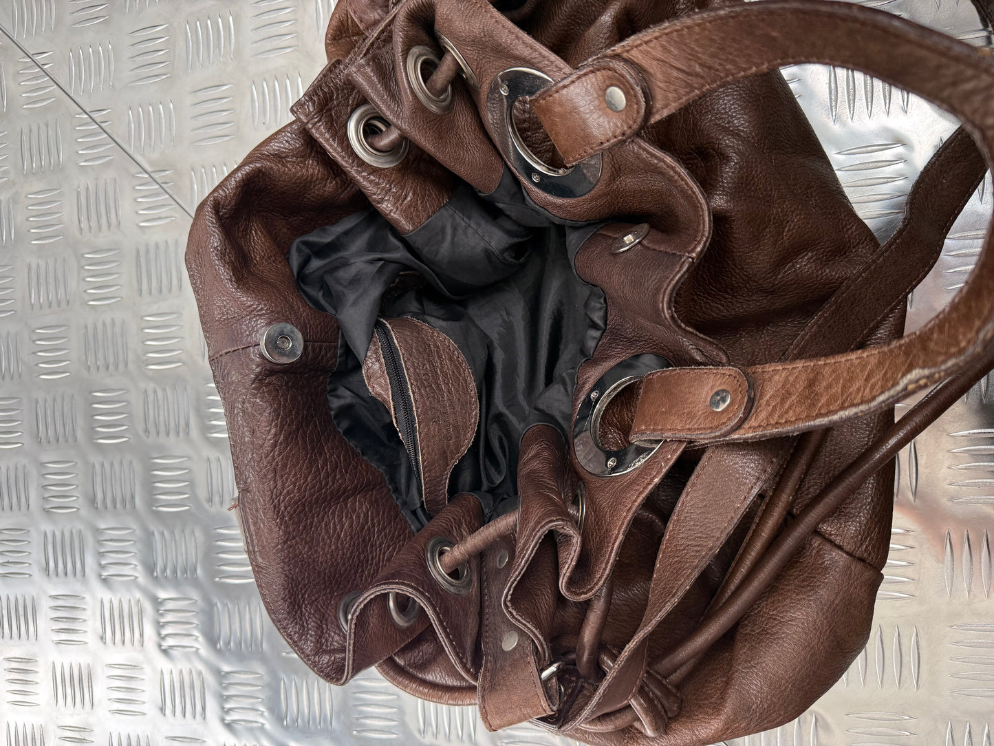 Vintage leather bucket bag TWINKLING GLOBAL