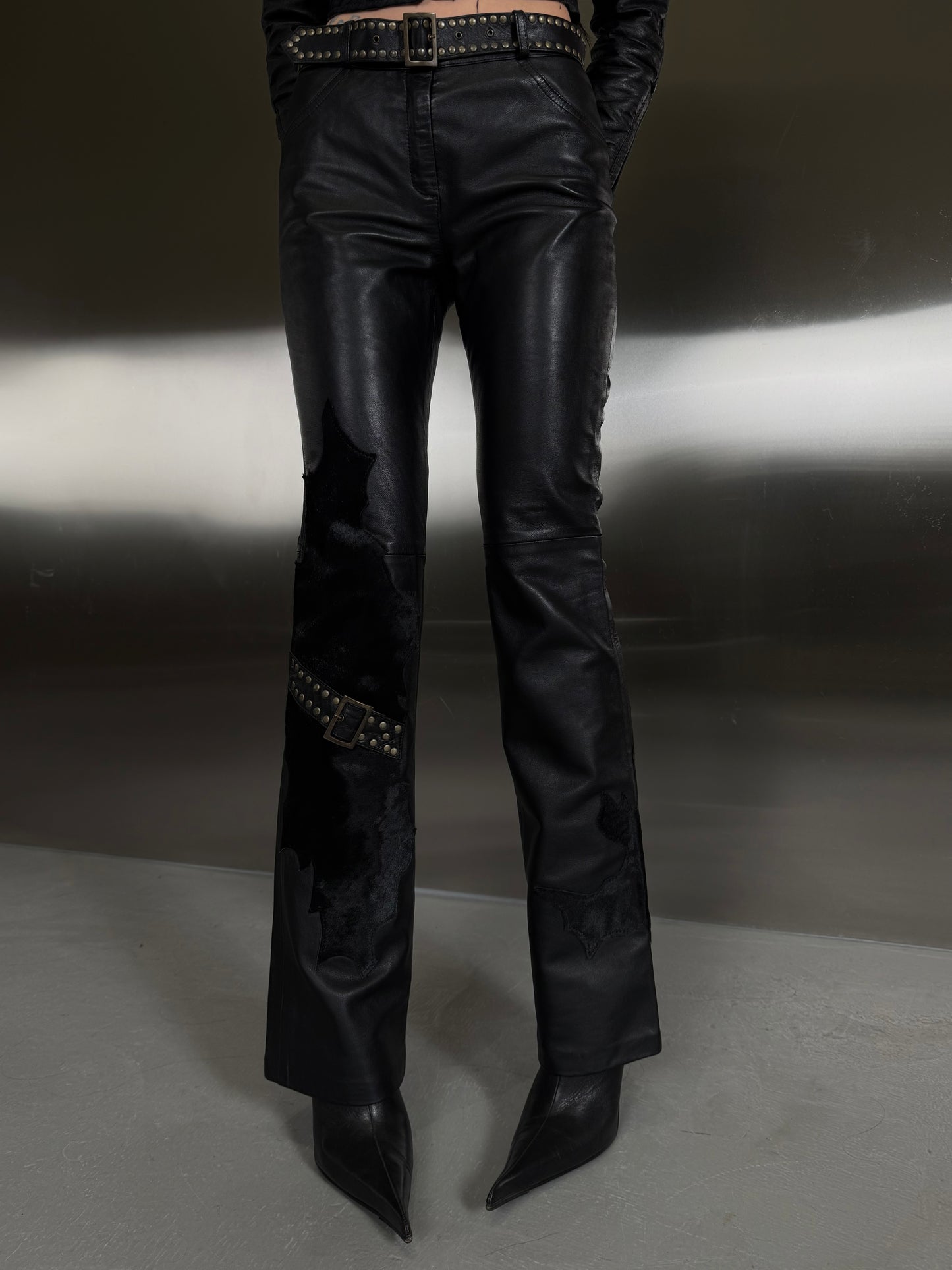 Vintage leather pants with textured inserts and studded strap detail TWINKLING GLOBAL