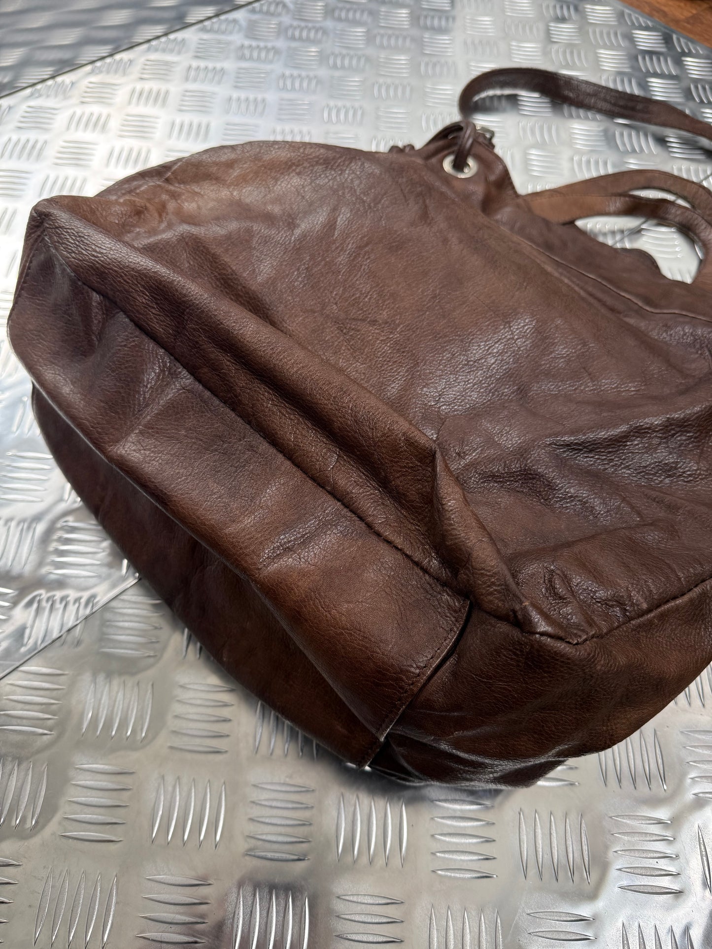 Vintage leather bucket bag TWINKLING GLOBAL