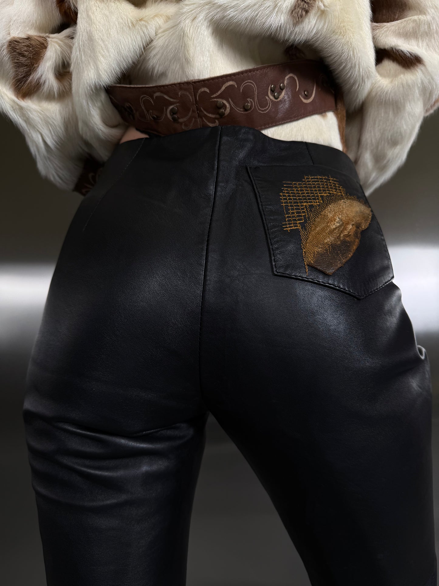 Vintage leather flared pants with patch details TWINKLING GLOBAL