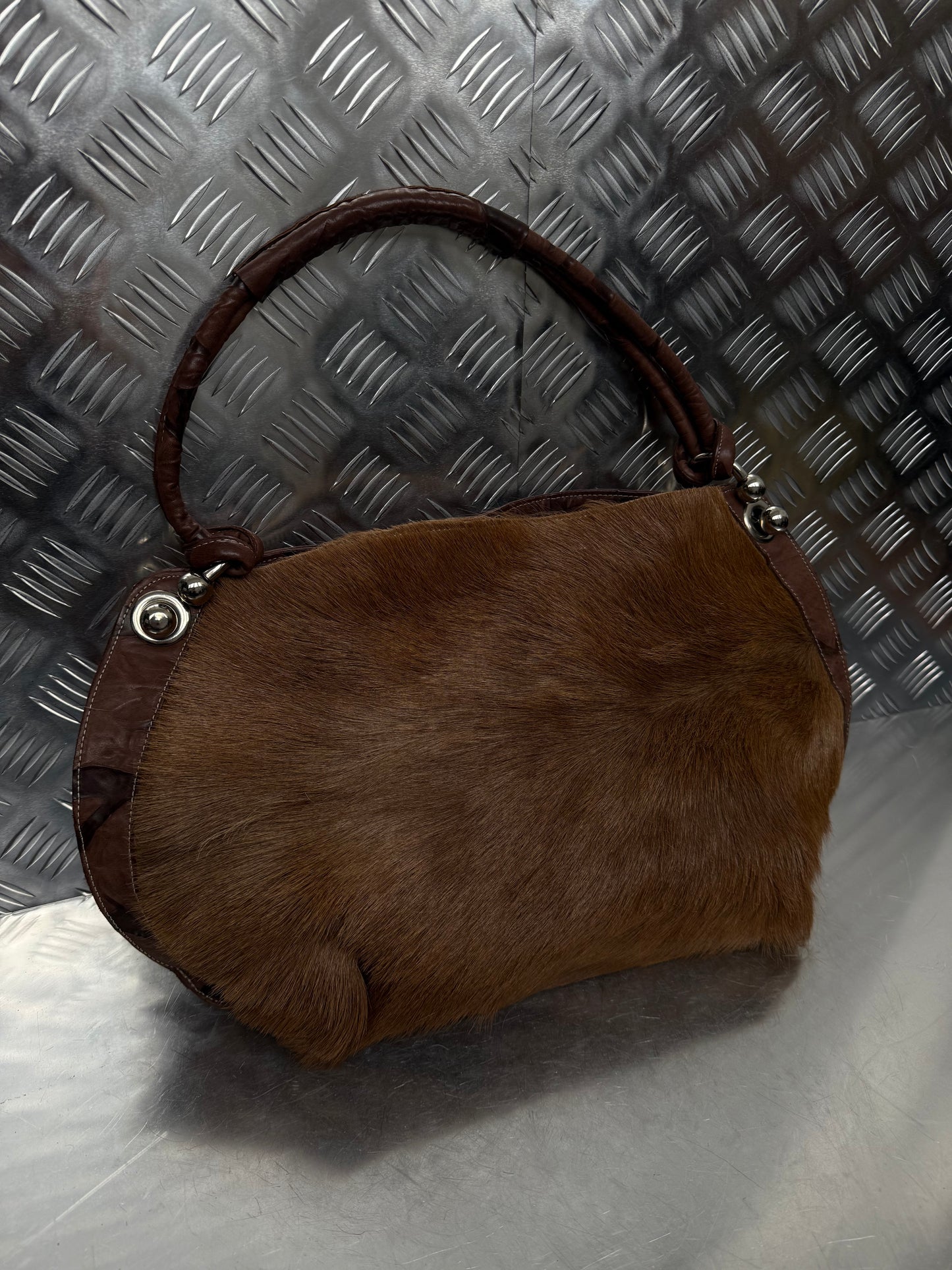 Vintage leather bag TWINKLING GLOBAL