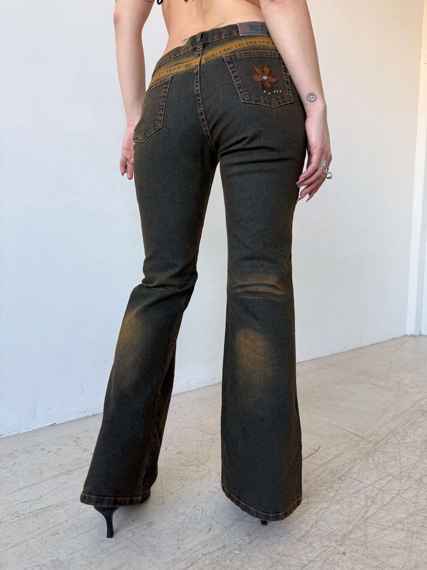 Vintage rust effect flared jeans TWINKLING GLOBAL