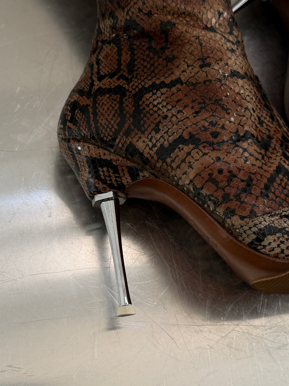 Vintage brown leather boots with metal heel TWINKLING GLOBAL