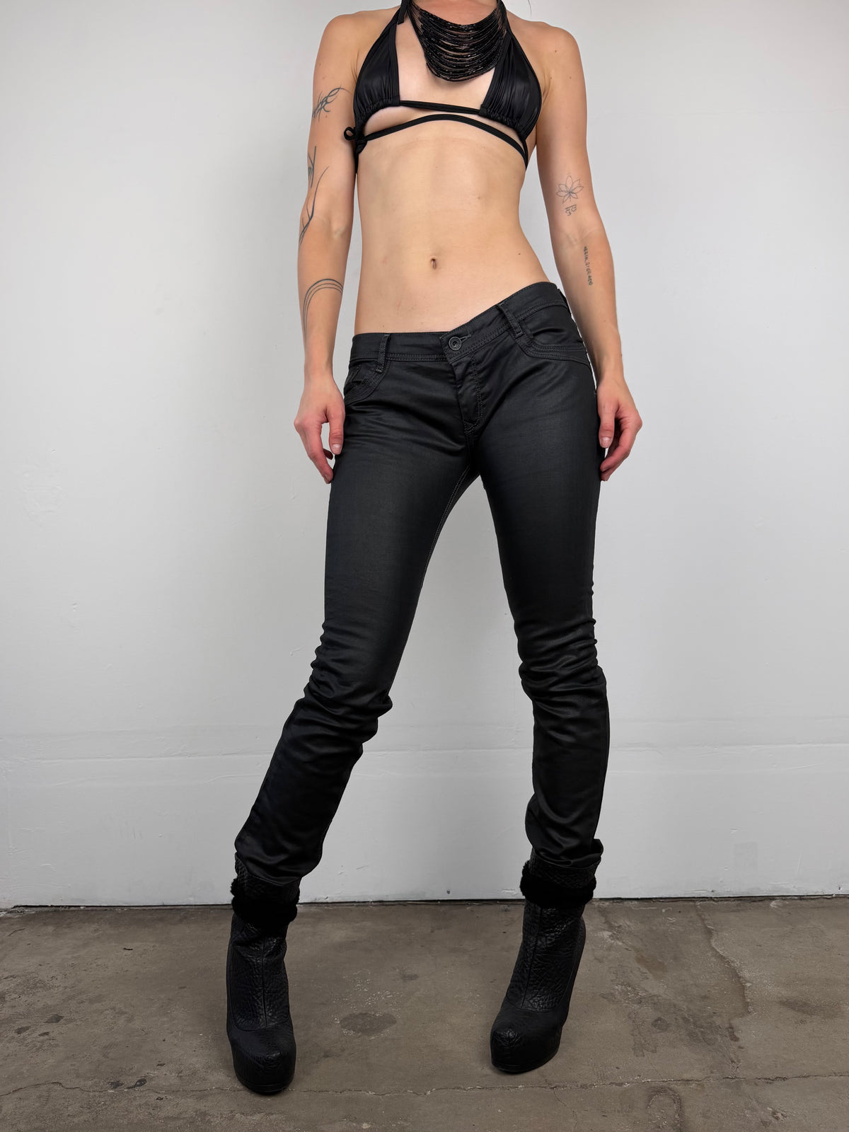 Black waxed denim jeans TWINKLING GLOBAL