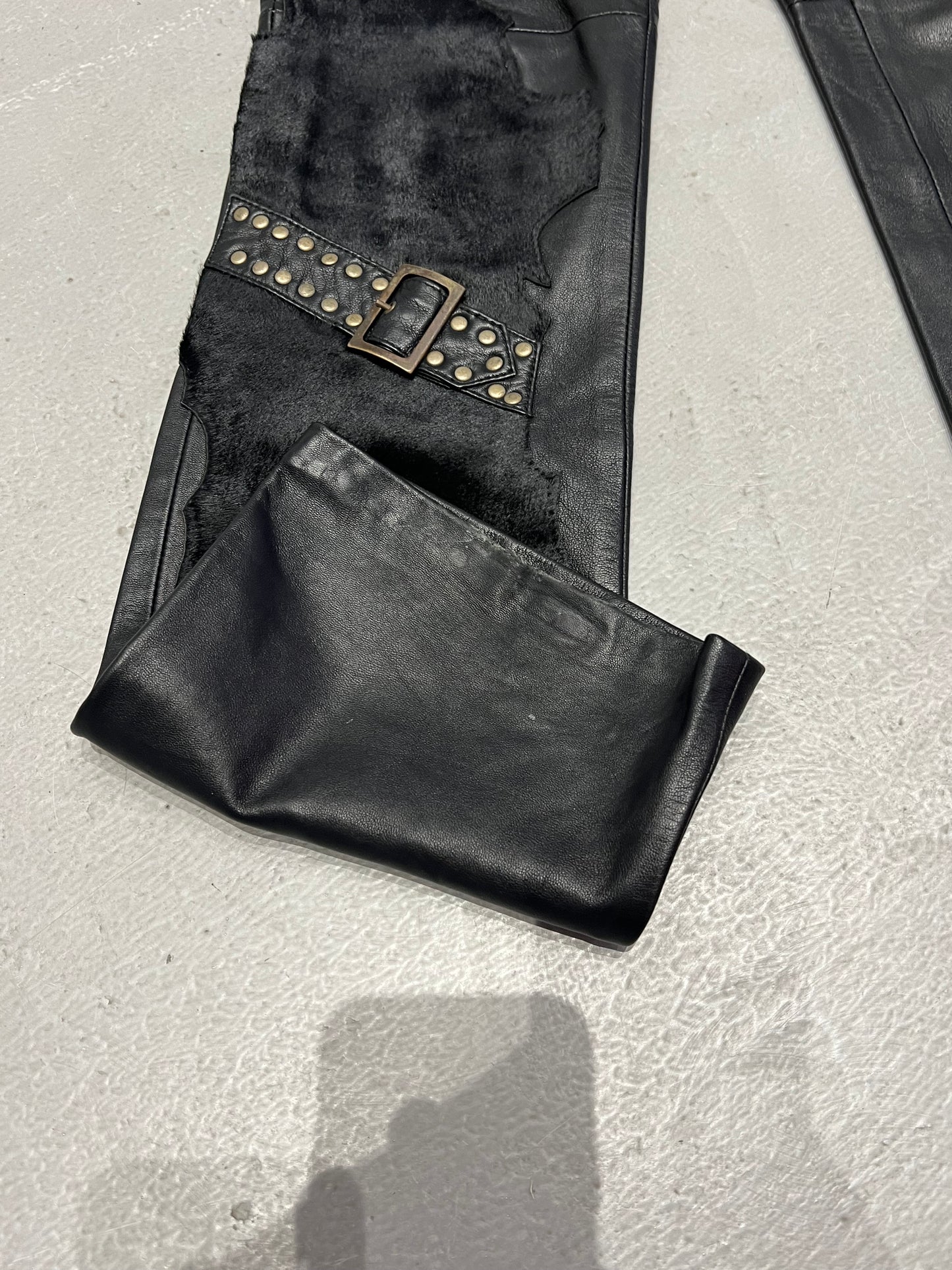 Vintage leather pants with textured inserts and studded strap detail TWINKLING GLOBAL