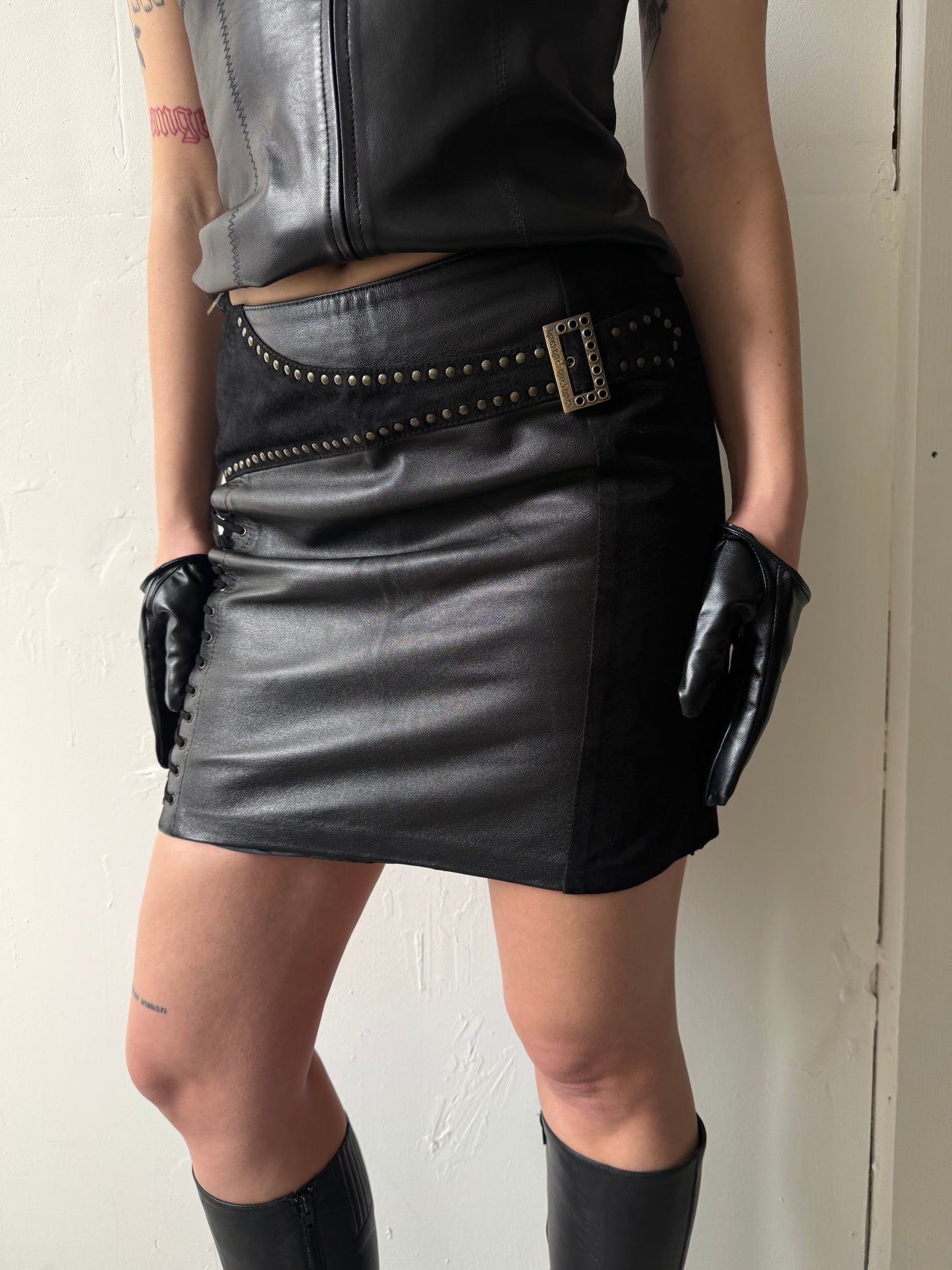Vintage leather mini skirt with suede inserts and lace-up detail TWINKLING GLOBAL